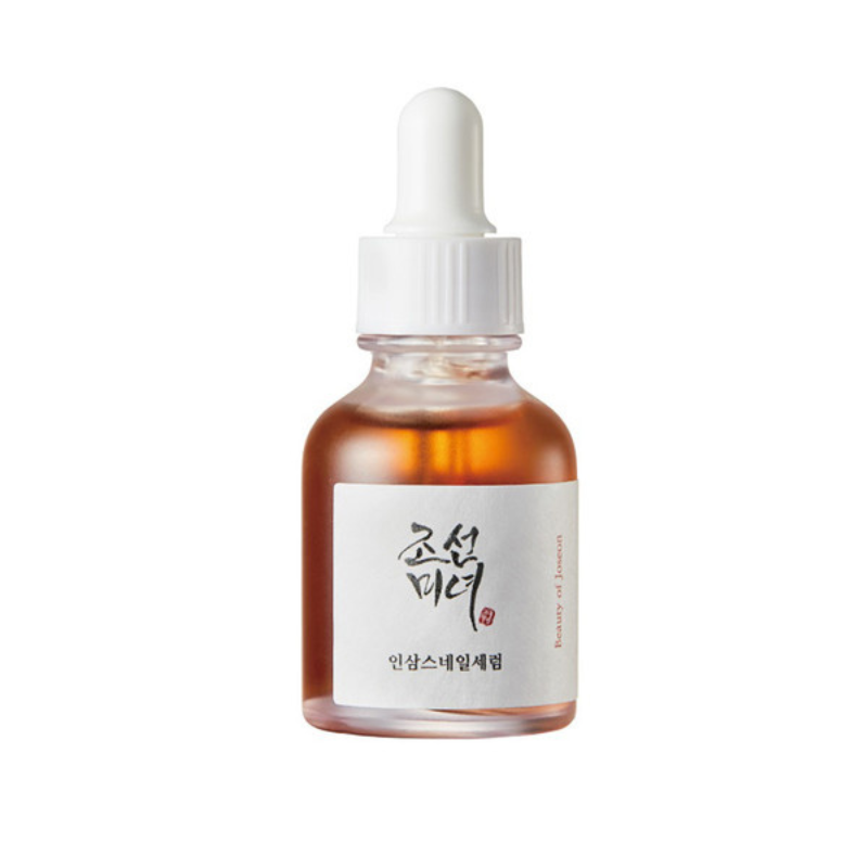 Bottle of skincare serum with a dropper on a white background