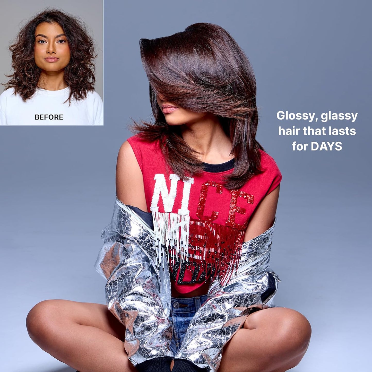 Person with glossy hair styled in a way that covers their face, wearing a red shirt and silver jacket, with text 'Glossy, glassy hair that lasts for DAYS' on a gray background.