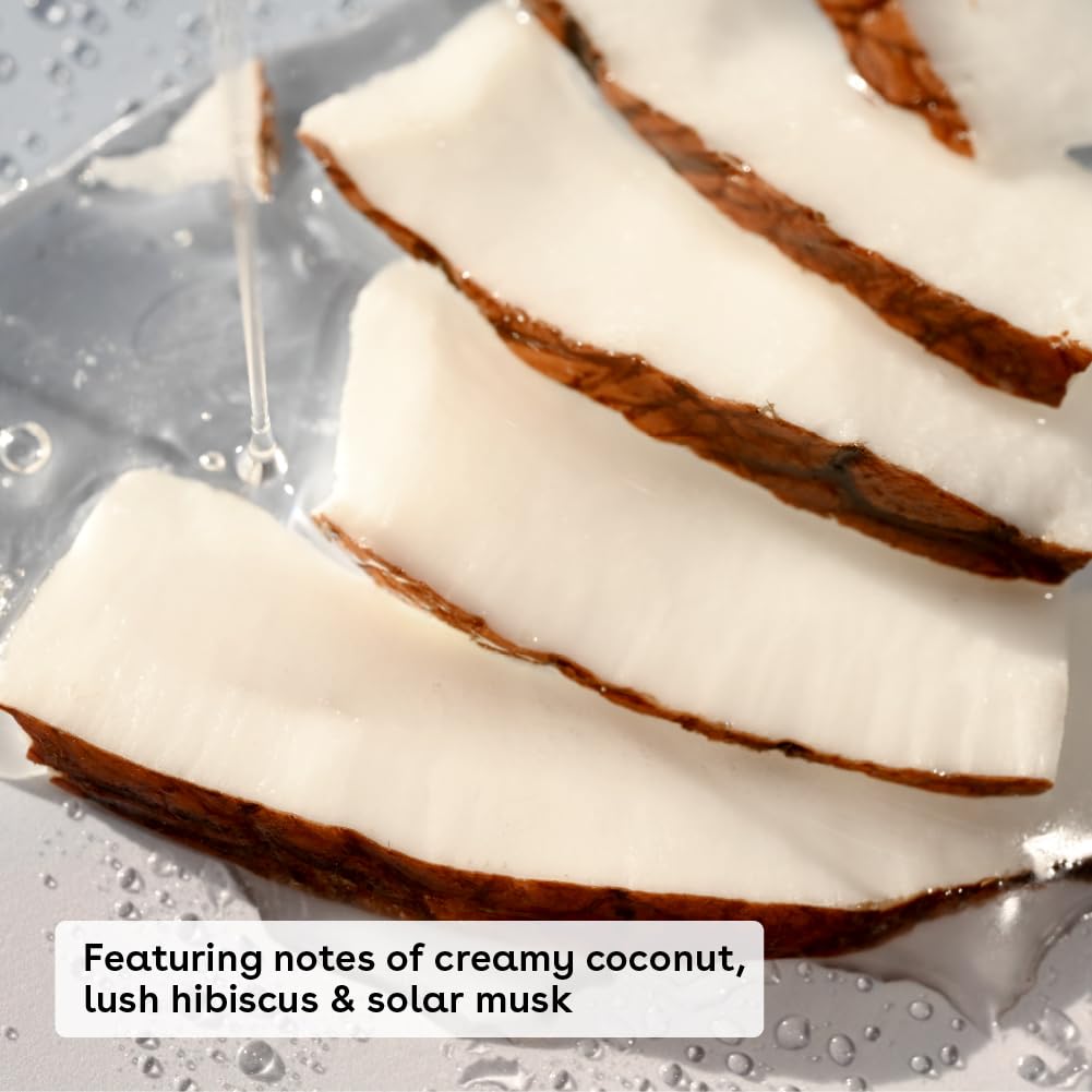 A close-up of sliced coconut with water droplets reflects its richness. Caption: EOS Shea Better 24H Body Lotion - Coconut Waters 473ml blends creamy coconut, lush hibiscus, and solar musk for 24-hour moisture.
