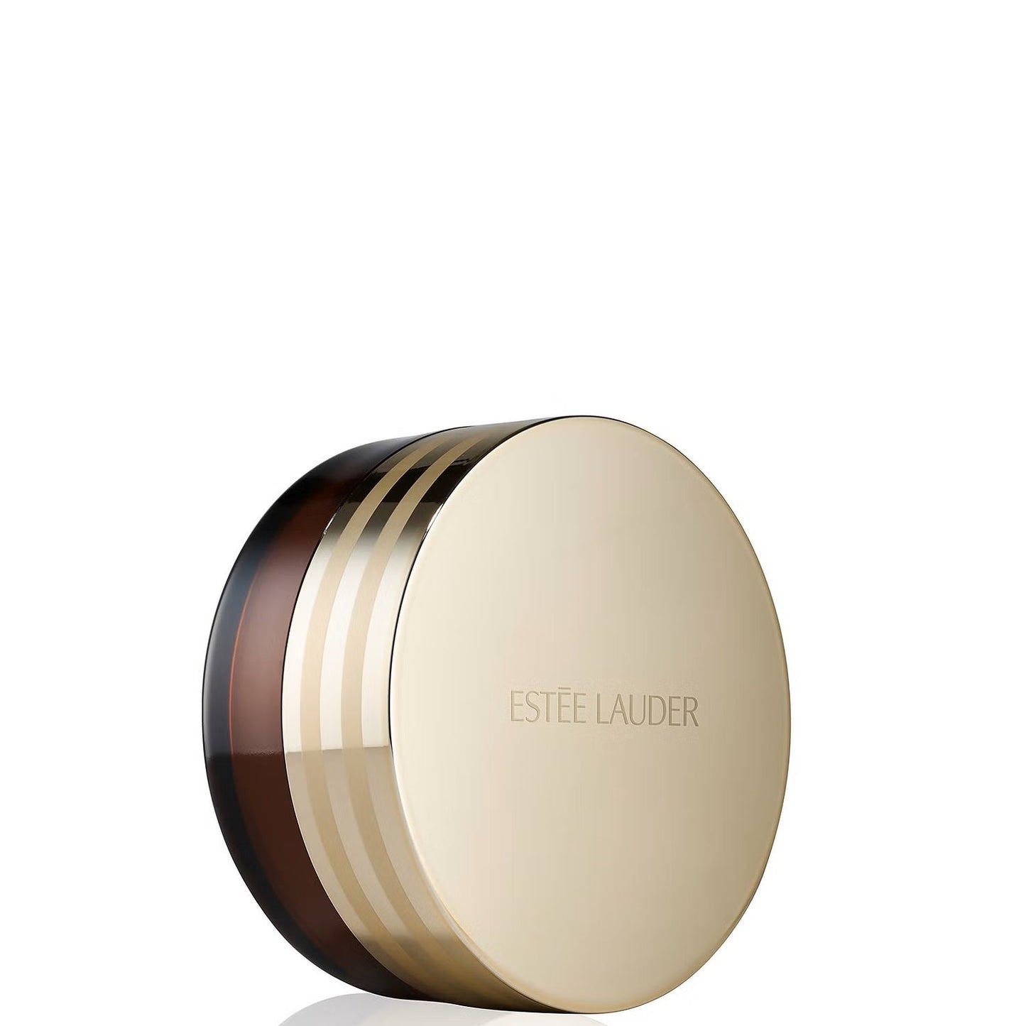 A round, gold and brown Estée Lauder Advanced Night Cleansing Balm container features a reflective lid engraved with ESTEE LAUDER and elegant horizontal stripes on the side.