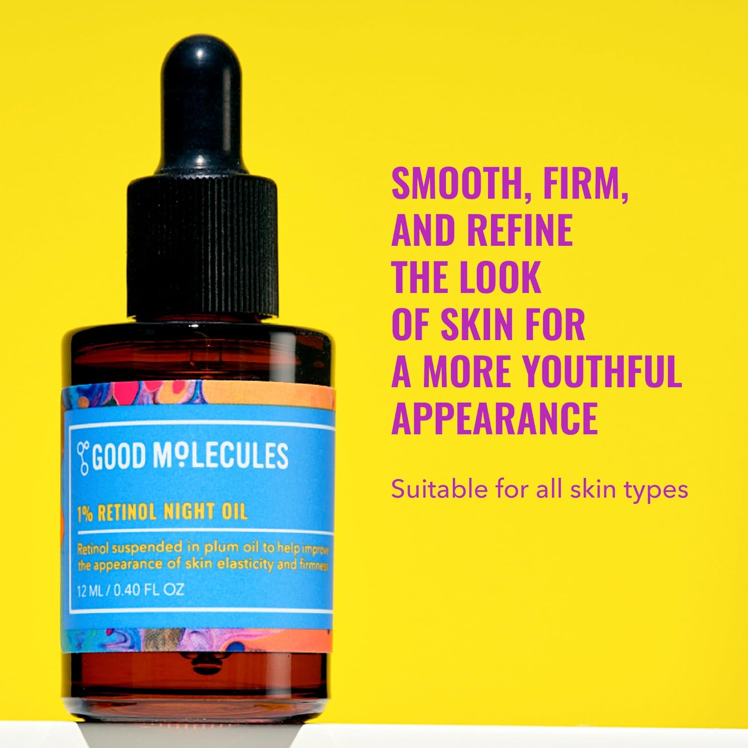Good Molecules 1% Retinol Night Oil bottle against a yellow background. Smooths, firms, and refines skin for a youthful appearance. Suitable for all skin types.