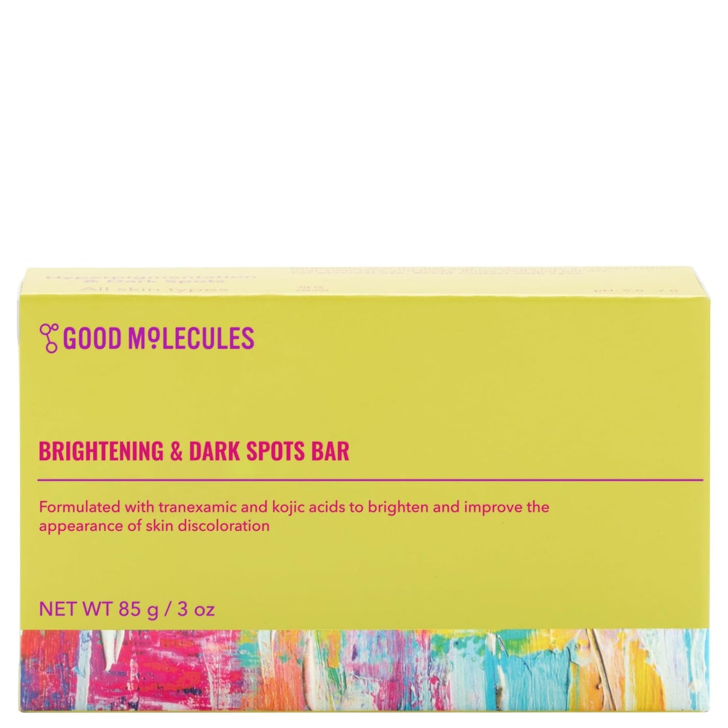 The Good Molecules Brightening & Dark Spots Bar with Kojic Acid sits against a yellow background, showcasing a colorful design at the bottom. It highlights tranexamic and kojic acids to brighten skin discoloration, weighing 85g (3 oz).