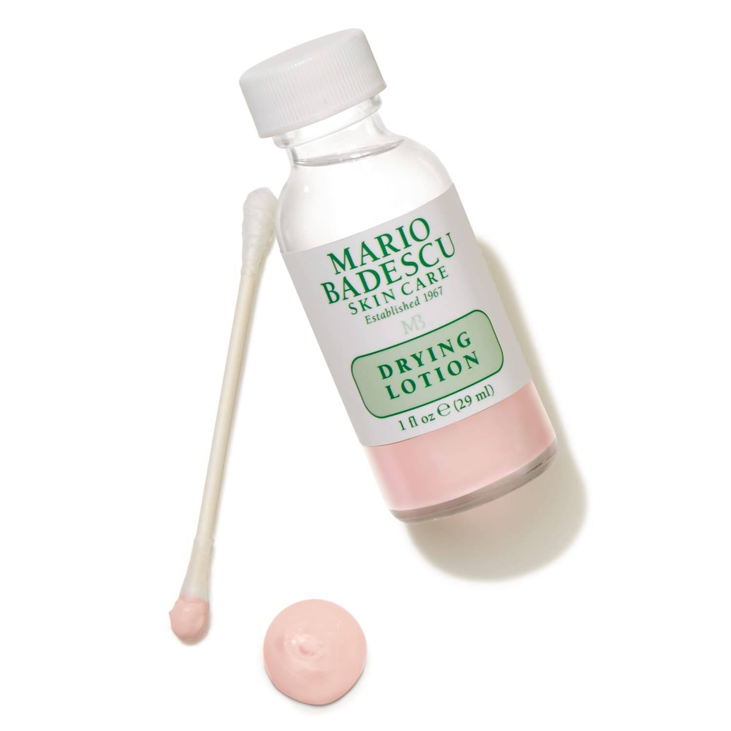 Mario Badescu drying lotion bottle with applicator on a white background