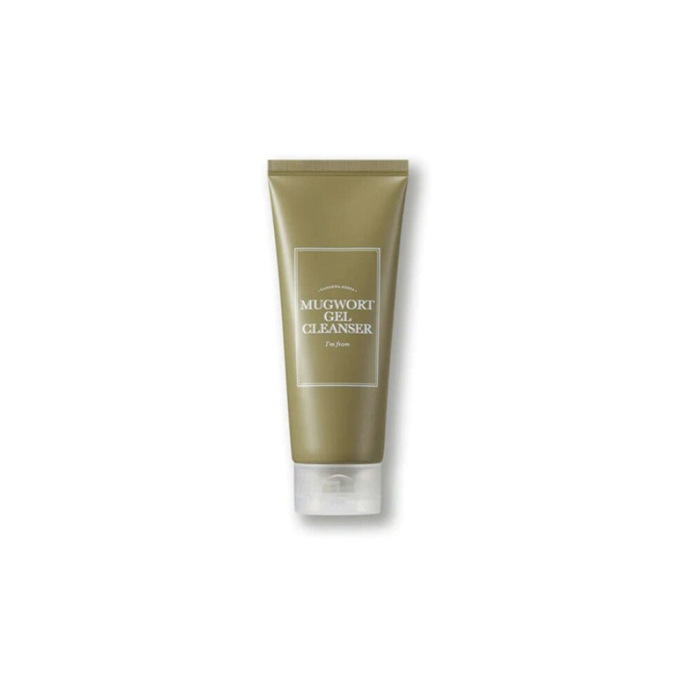 The Im From Mugwort Gel Cleanser 150ml features a muted green design with white text, an upright tube, and a semi-transparent cap. Infused with cold extraction processes for effective pore cleansing, it embodies simplicity and elegance in skincare.