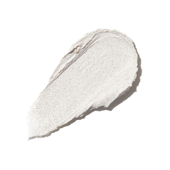 A smear of thick, white Naturium KP Scrub & Mask 226g with a slightly textured surface is shown on a plain white background.