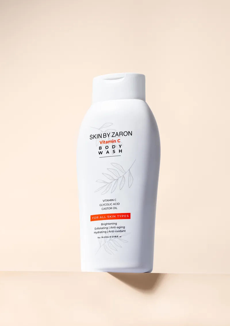 White bottle of 'Skin by Zaron' Vitamin C Body Wash on a beige background