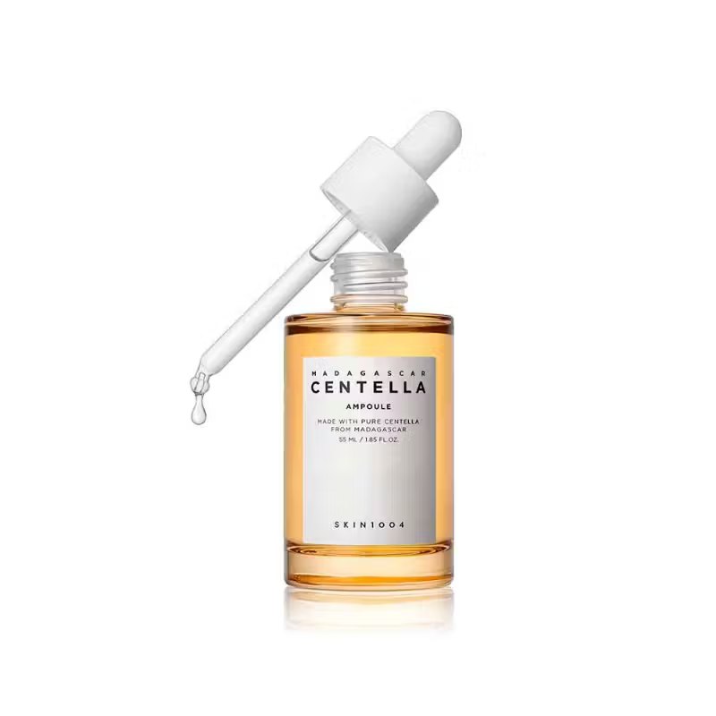 SKIN1004 Madagascar Centella Ampoule with dropper dispensing serum. Made with 100% Centella Asiatica extract to soothe, hydrate, and repair skin barrier