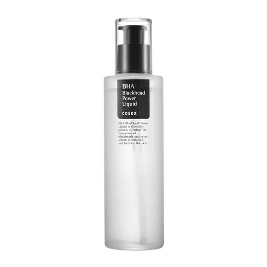The COSRX BHA Blackhead Power Liquid 100ml features a clear bottle with a black pump and label, emphasizing its minimalist design. The label mentions its purpose of reducing blackheads and exfoliating dead skin cells using natural ingredients for clear, healthy skin.