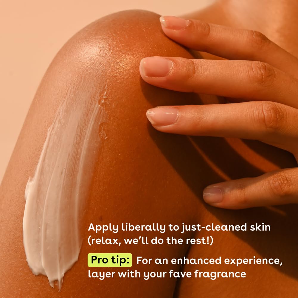 A close-up of a shoulder with eos Shea Better 24H Moisture Body Lotion - Jasmine Peach on it. A hand gently rests on top. Text reads: Apply liberally to just-cleaned skin for hydration and sensitive skin care. Pro tip: Layer with your favorite fragrance.