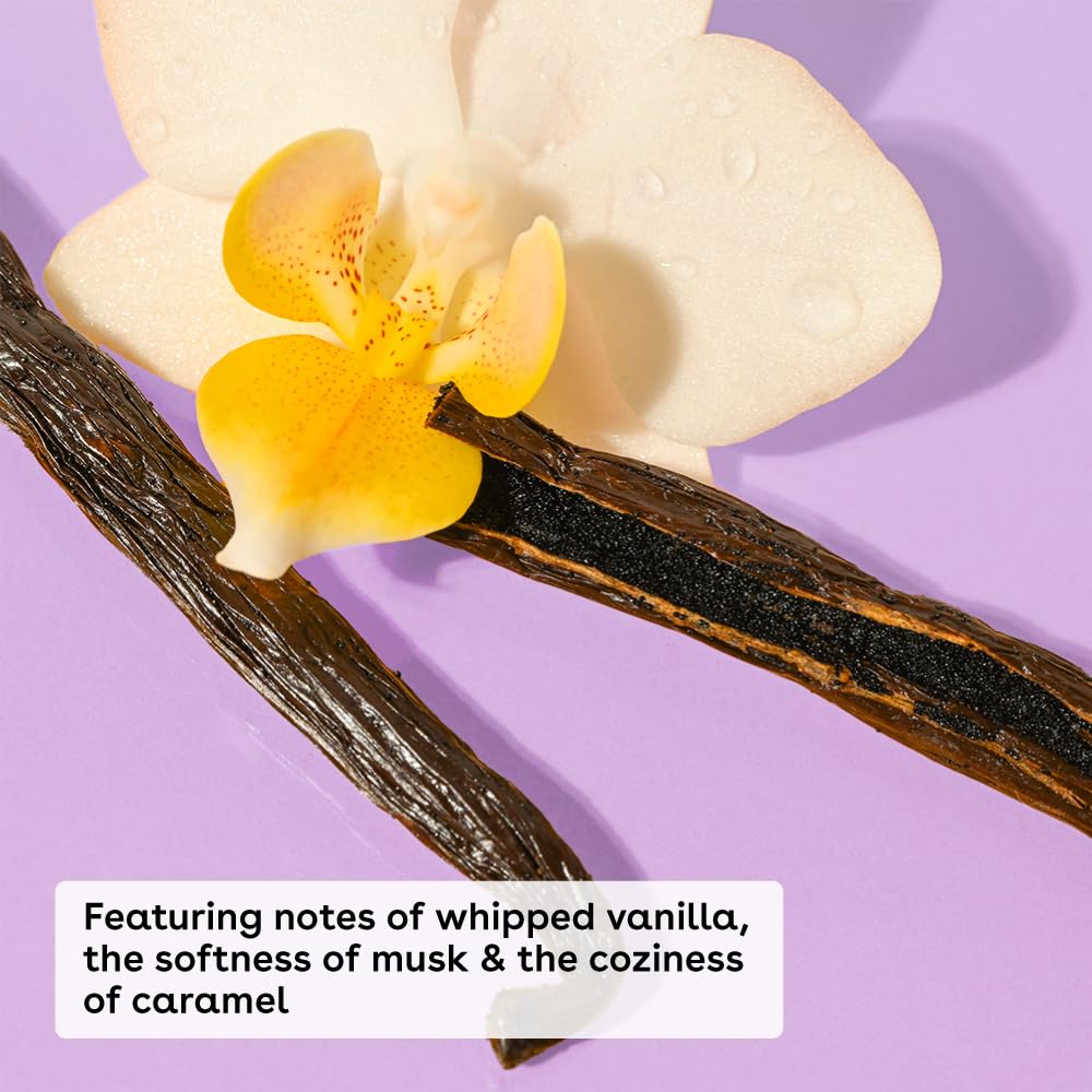 EOS Shea Better 24H Moisture Body Lotion - Vanilla Cashmere by eos combines whipped vanilla, soft musk, and cozy caramel. It features a purple backdrop adorned with vanilla pods and a yellow-white orchid, delivering sustainable skincare and long-lasting 24-hour moisture.