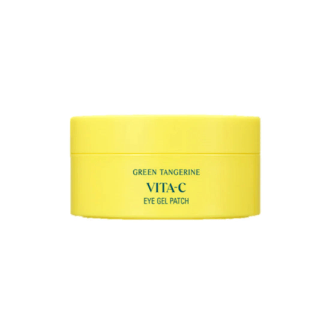 A yellow cylindrical container marked Goodal Green Tangerine Vita-C Eye Gel Patch 72g claims to illuminate dark circles using vitamin C, displayed on a white background.