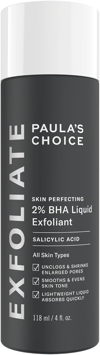 The 118 ml bottle of Paulas Choice SKIN PERFECTING BHA Liquid Exfoliant by PAULAS CHOICE with 2% salicylic acid removes blackheads, unclogs pores, exfoliates dead skin, evens skin tone, and absorbs quickly. Its suitable for all skin types.