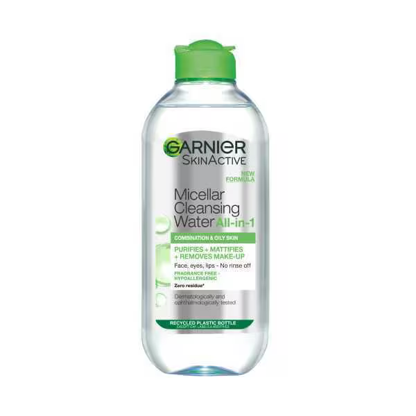 Garnier Micellar Cleansing Water, Makeup Remover for Combination & Oily Skin, is a facial cleanser and makeup remover. The clear bottle with a green cap displays product details and usage instructions on its label.