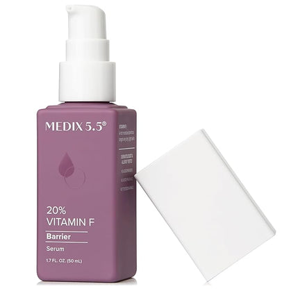 A mauve bottle of Medix 5.5, 20% Vitamin F Skin Barrier Serum with a pump dispenser and white cap highlights its blend of Omega-3 and Omega-6 for skin protection, in a volume of 1.75 oz (50 mL).