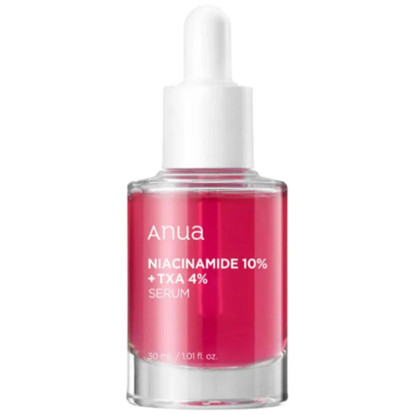 A clear glass bottle of Anua Niacinamide 10% + TXA 4% serum with a white dropper cap and vibrant pink liquid inside.