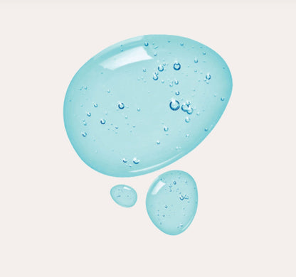 Blue gel-like substance with bubbles on a light gray background
