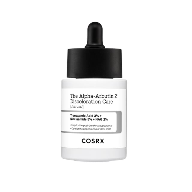 The sleek white COSRX The Alpha-Arbutin 2 Discoloration Care Serum 50ml features a black dropper cap, with a label highlighting Tranexamic Acid 3%, Niacinamide 5%, and NAG 2%, emphasizing its potent formula for improving post-breakout appearance and dark spot care.