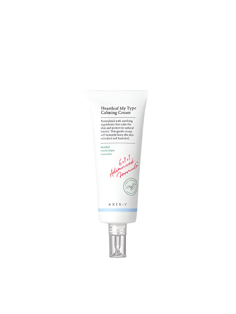 A 60ml white tube of AXIS-Y Heartleaf My Type Calming Cream, featuring a silver cap and a label with green and pink text, emphasizes centella asiatica for soothing hydration.