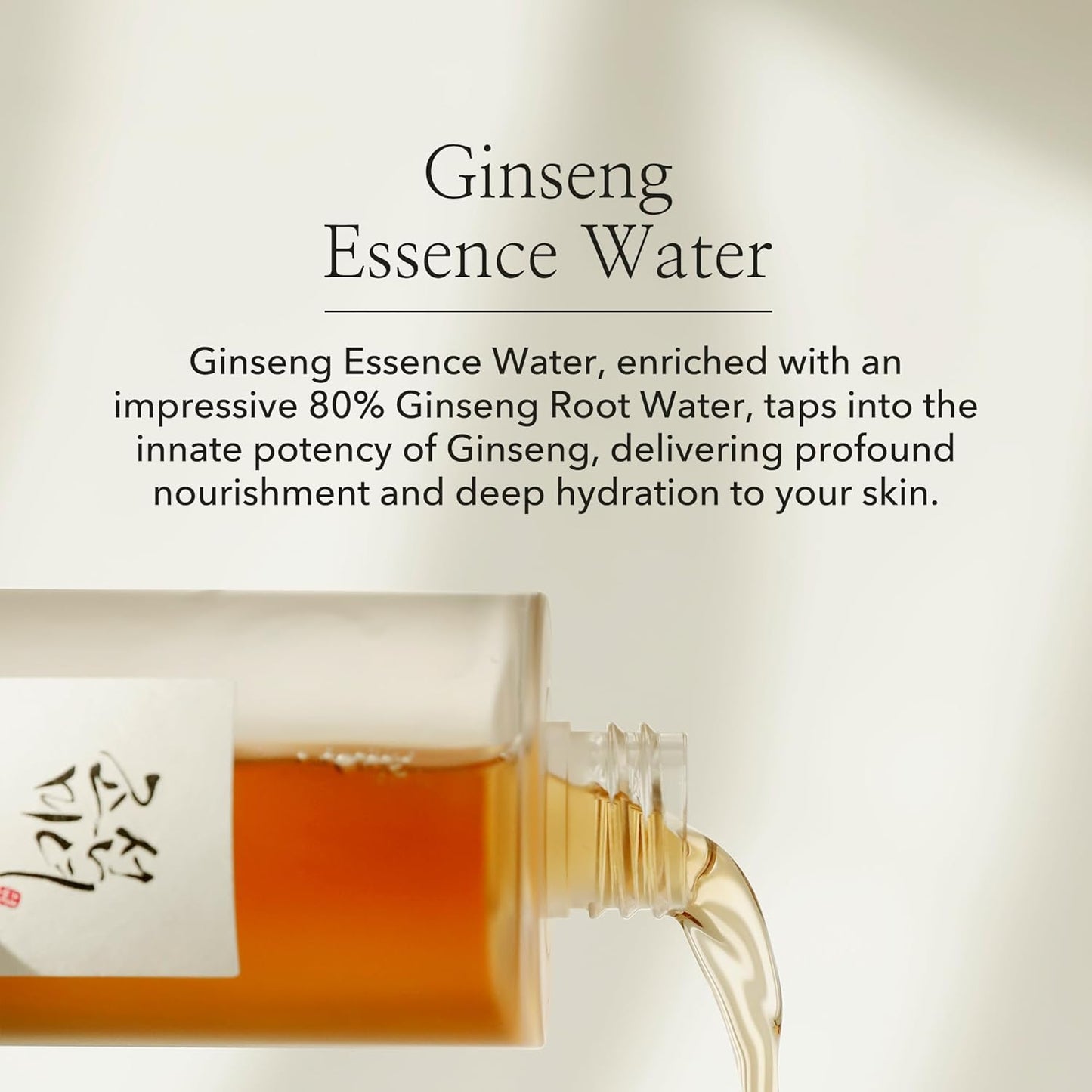 The Beauty of Joseon Ginseng Essence Water Toner, enriched with 80% Ginseng Root Water, pours from a transparent bottle against a light background. It embodies Korean beauty rituals by nourishing and hydrating skin for a glass skin effect.