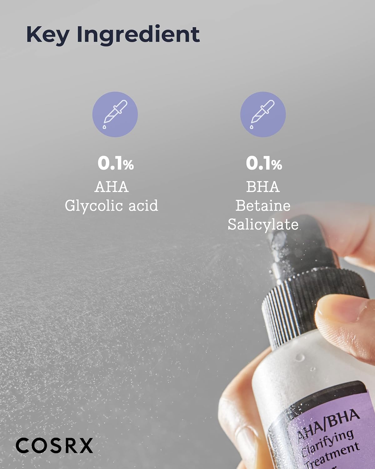 Close-up of a hand holding COSRXs AHA/BHA Clarifying Treatment Toner, labeled with 0.1% AHA Glycolic Acid and 0.1% BHA Betaine Salicylate for exfoliating congested pores, while a refreshing mist sprays in the background.