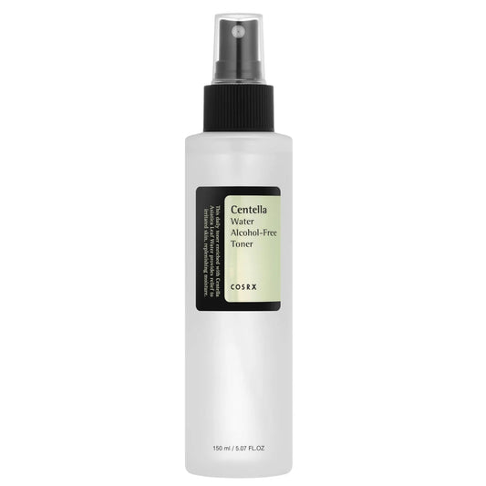 The COSRX Centella Water Alcohol-Free Toner is a calming toner in a 150 ml white spray bottle with a black label and nozzle, featuring highlighted details and ingredients on its label.