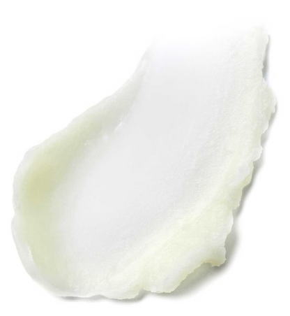 A close-up of a smear of Estée Lauder Advanced Night Cleansing Balm by ESTEE LAUDER, showcasing its creamy, slightly uneven texture with nourishing Safflower Seed Oil, spread on a white background.