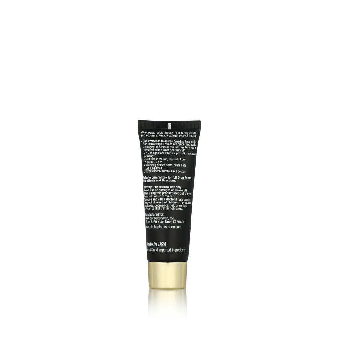 A sleek black tube with a gold cap stands elegantly on a white background. The text suggests its Black Girl Sunscreen Make It Matte™ SPF 45, thoughtfully crafted for women of color.