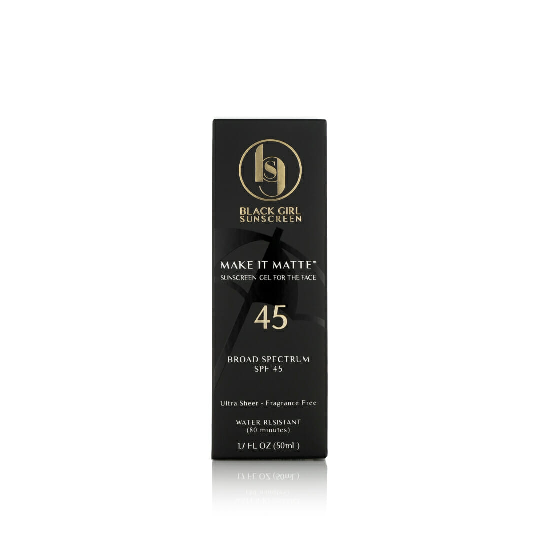 A black rectangular box of Black Girl Sunscreen shows the logo. Text reads Make It Matte™ SPF45 Vegan Sunscreen Gel for the Face, 50ml, Ultra Sheer, Fragrance-Free, Water Resistant (80 min), ideal for women of color.