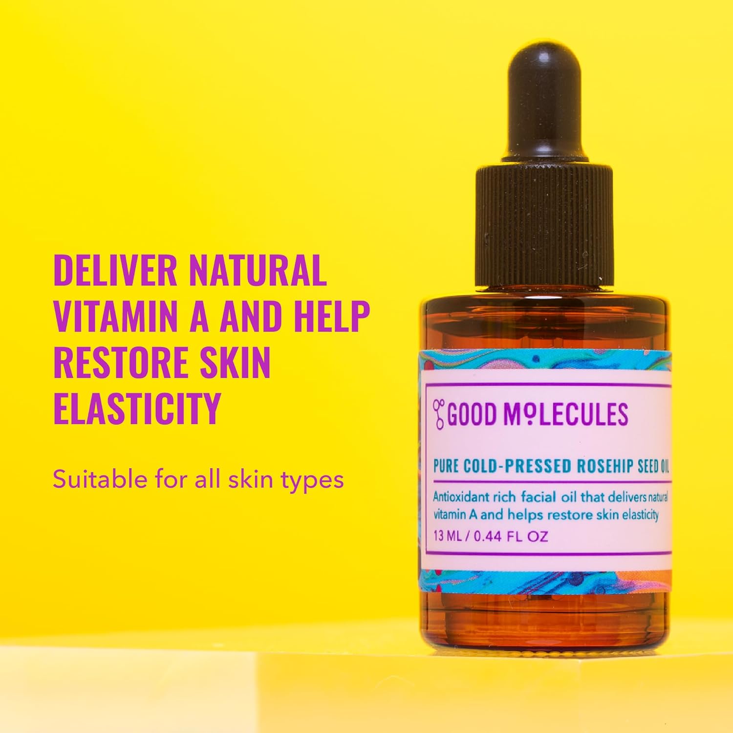 Good Molecules Pure Cold-Pressed Rosehip Seed Oil bottle against a yellow background. Delivers natural Vitamin A and helps restore skin elasticity.