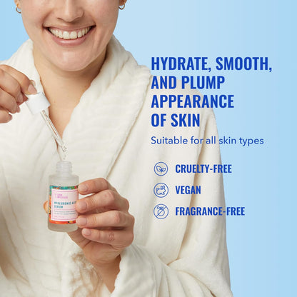 A person in a white bathrobe smiles, holding a dropper of Good Molecules Hyaluronic Acid Serum over the bottle. Text on blue background says: Hydrate, smooth, and plump your skin for radiance. Suitable for all skin types. Cruelty-free, vegan, fragrance-free.