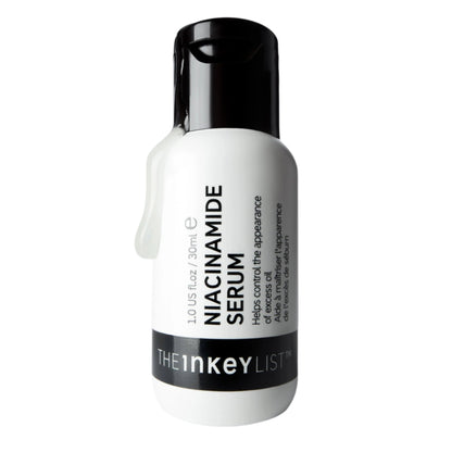 A white bottle of The INKEY List™ Niacinamide Serum 30ml features a black cap. Ideal for acne-prone skin, it helps control the appearance of excess oil.
