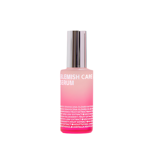 ISOI Blemish Care Serum in a pink gradient bottle with a silver cap, formulated with Bulgarian Rose Oil and Arbutin to brighten skin and reduce dark spots.
