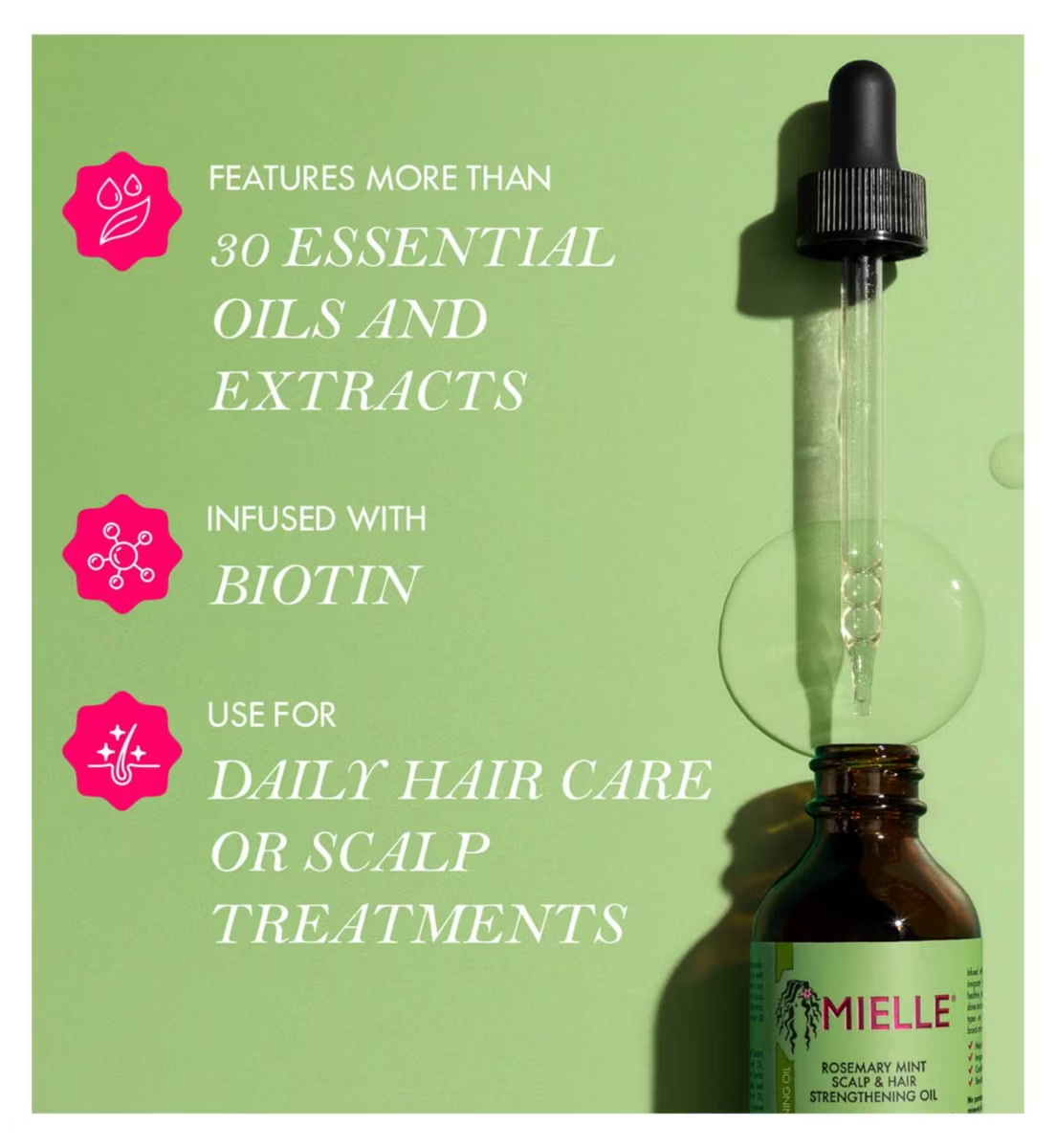 Bottle with dropper labeled 'Mielle' on a green background with text about essential oils and biotin.