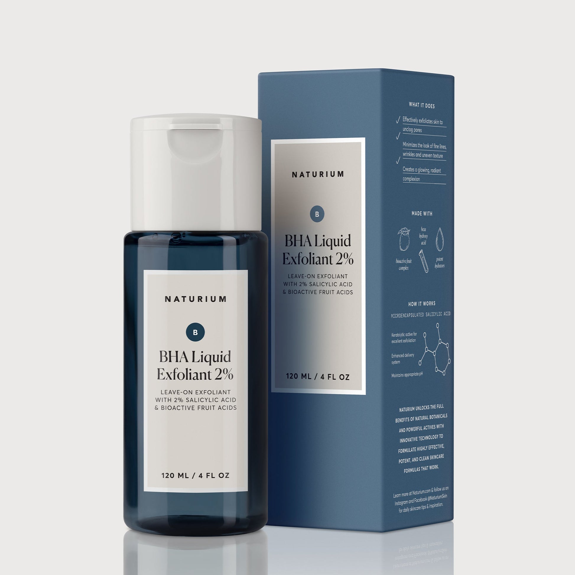 A blue bottle of Naturium BHA Liquid Exfoliant 2% (120ml) – Pore Refining Exfoliant stands by its matching box, both showing product details. This formula from Naturium helps unclog pores for smoother, clearer skin.