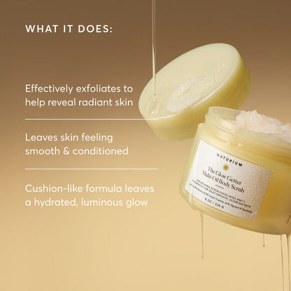 Naturium body scrub with open jar and exfoliating glove on a beige background