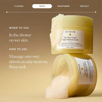 Two containers of Naturium body scrub with instructions on a beige background