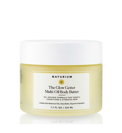 A 7.7 fl oz (232 ml) jar of NATURIUM The Glow Getter Multi-Oil Body Butter with a white lid and pale yellow container, featuring an oil-infused formula that deeply hydrates and conditions skin.
