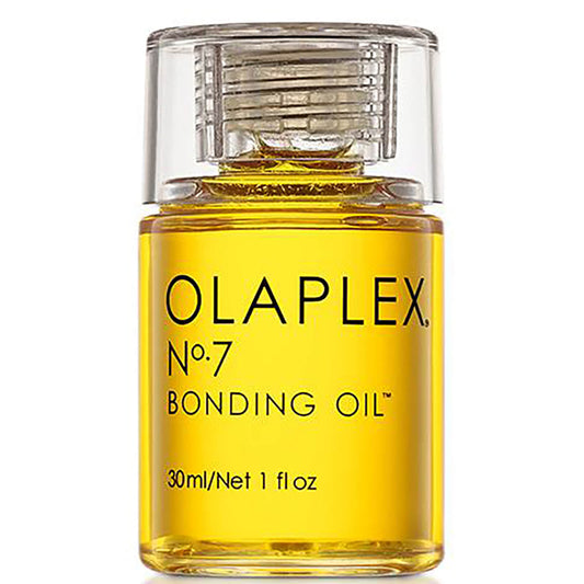 A clear bottle of OLAPLEX No.7 Bonding Oil 30ml, featuring a silver cap and yellow liquid, is shown against a white background. The label highlights its hair repair benefits.