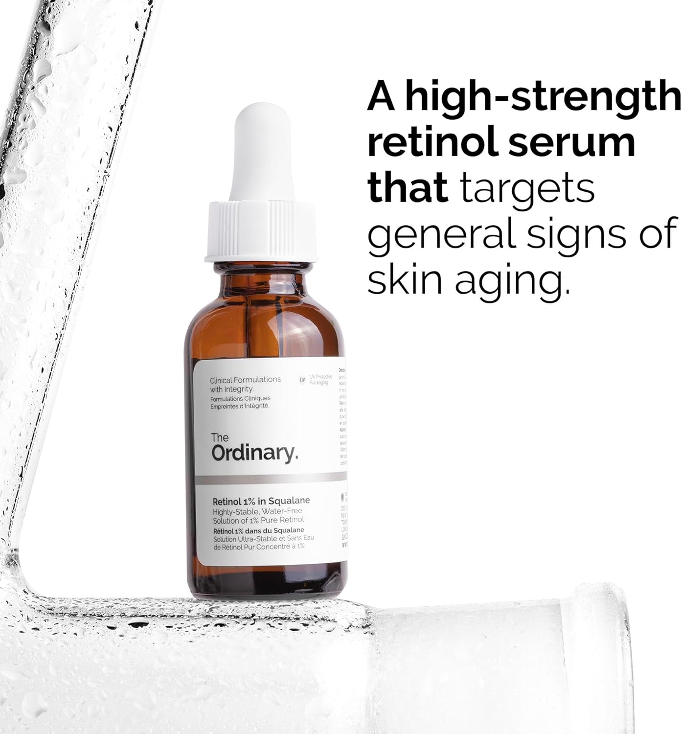 A bottle of The Ordinary Retinol 1% In Squalane 30ml sits against a textured transparent background. Text states: The Ordinarys potent retinol serum in squalane targets signs of aging.