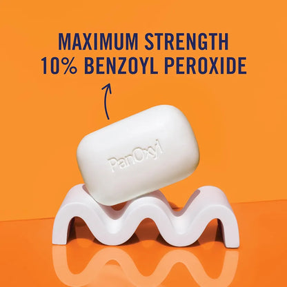 Bar of soap with 'PerOxy' branding on an orange background, labeled as maximum strength 10% benzoyl peroxide.