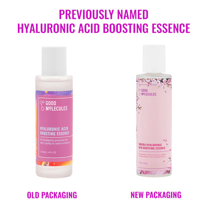 Two bottles of Good Molecules Sakura Hyaluronic Acid Boosting Essence are shown side by side; the new design on the right features a floral sakura label highlighting its hydrating benefits.