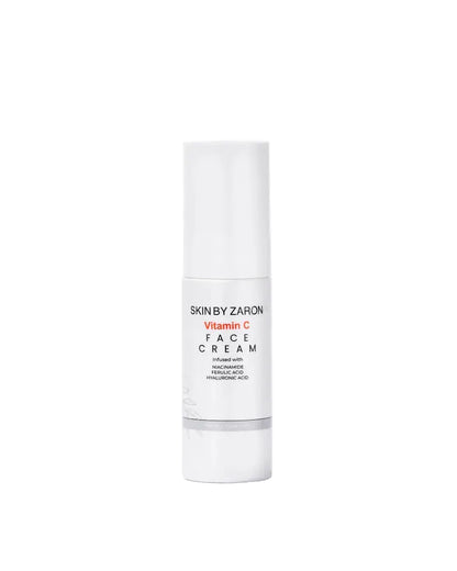 White skincare bottle labeled 'Skin by Zaron' on a white background