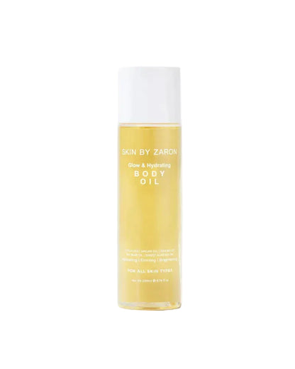 Body oil bottle with white cap on a white background