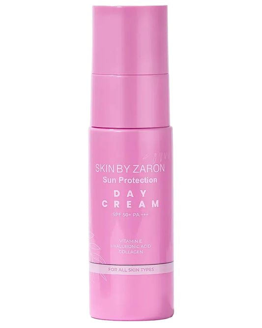 Pink bottle of Skin by Zaron Day Cream on a white background