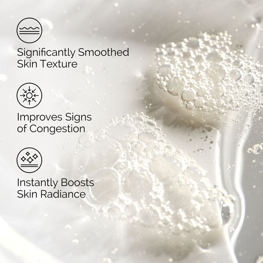 Skincare product with text highlighting benefits on a light background