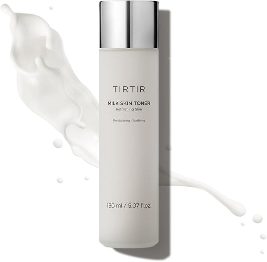 The TIRTIR Milk Skin Toner - 150ml features a hydrating formula labeled Moisturizing, Soothing, Refreshing Skin and comes with a silver cap. Its white liquid texture is ideal for all skin types.