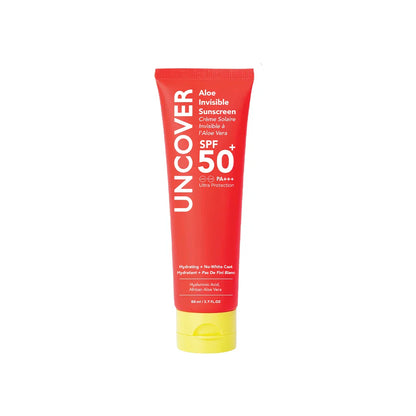 Red sunscreen tube labeled 'Uncover' with SPF 50 on a white background