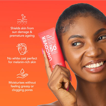 Woman holding a sunscreen tube with product features on an orange background