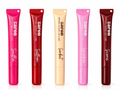 Five  gloss lip care tubes in assorted vibrant colors (pink, red, beige, light pink, and dark red) lined up side-by-side on a white background.