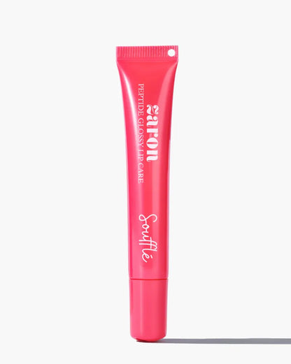 A bright pink squeeze tube of Zaron Peptide Gloss Lip Care by Souffle, standing upright on a clean white background with a soft shadow.